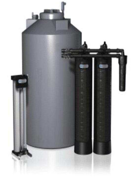 A whole-house water filtration system with a large gray tank and two black filter tanks.