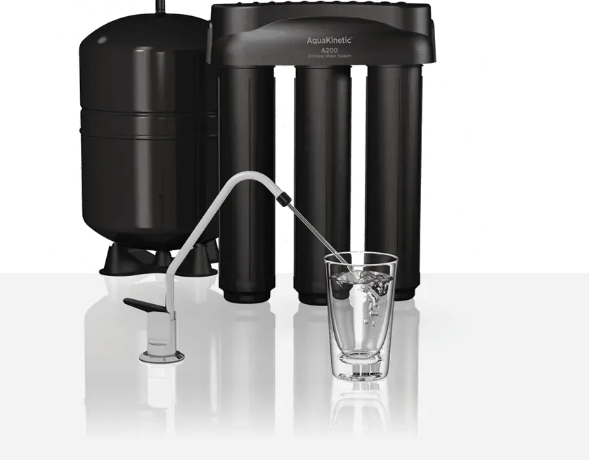 Black water filtration system dispensing water into a glass.