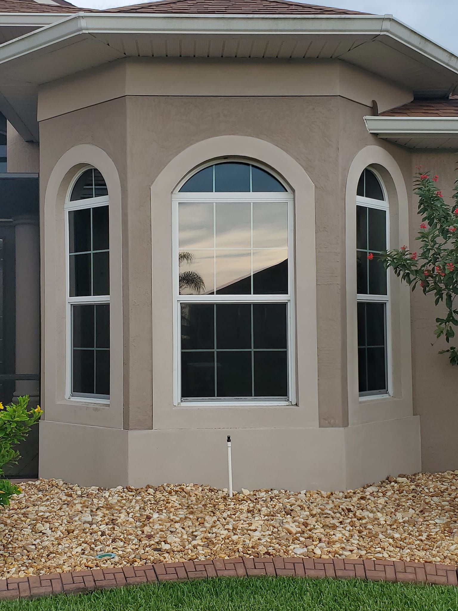 A house with a bay window and a lot of windows