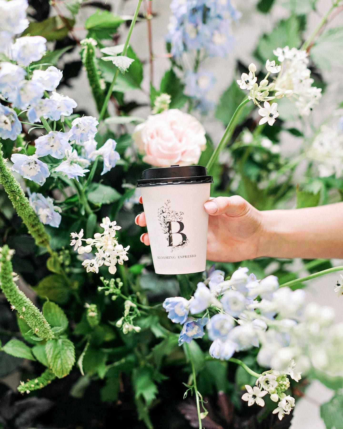Holding a Cup of Coffee — Gig Harbor, WA — Blooming Espresso