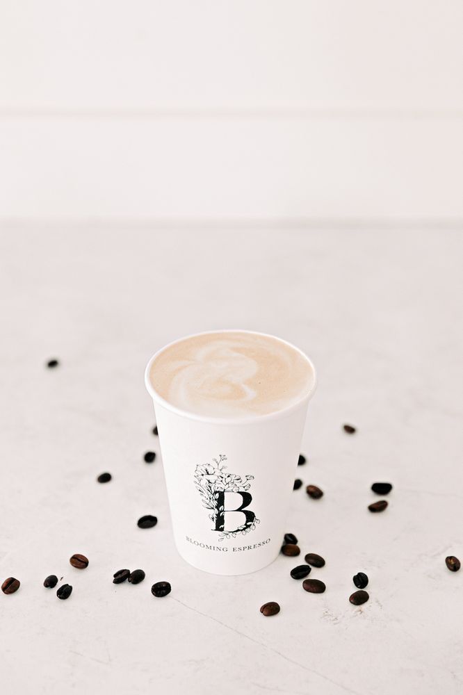 Cup of Coffee with Coffee Beans — Gig Harbor, WA — Blooming Espresso