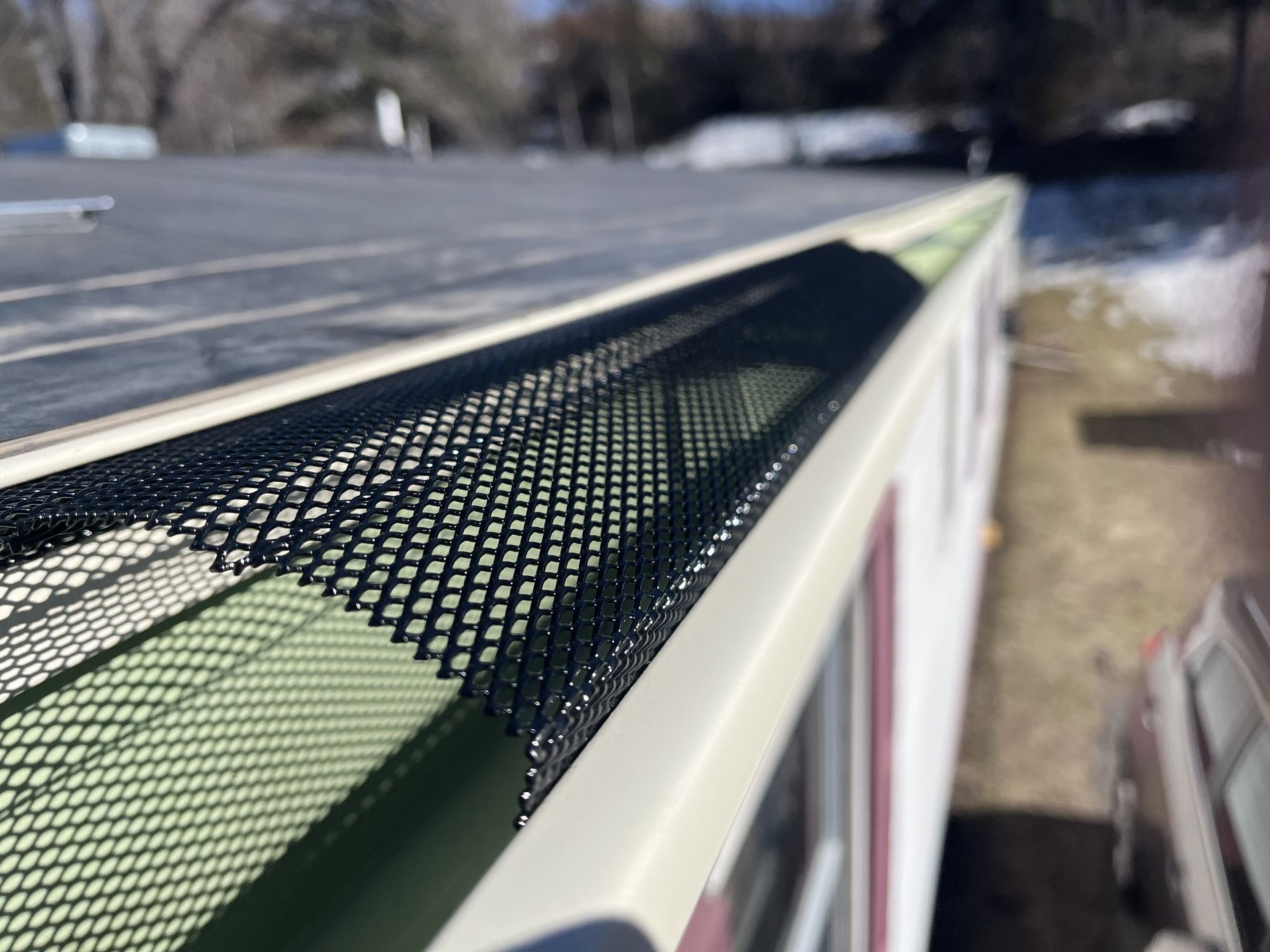 Rain Gutter Guard System On Roof Of House - Rochester, MN - Clark's Seamless Gutters Inc