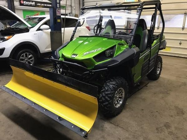 Green Vehicle With Dozer On Front — Passerini's Auto Service — Kittanning, PA