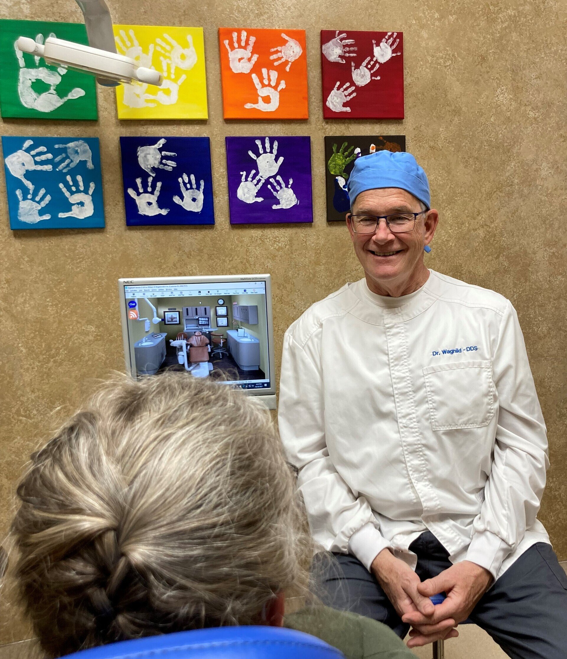 Dentist Showing Senior Patient Model of Dentures — Minnetonka, MN — Cendar Hill Dental Center