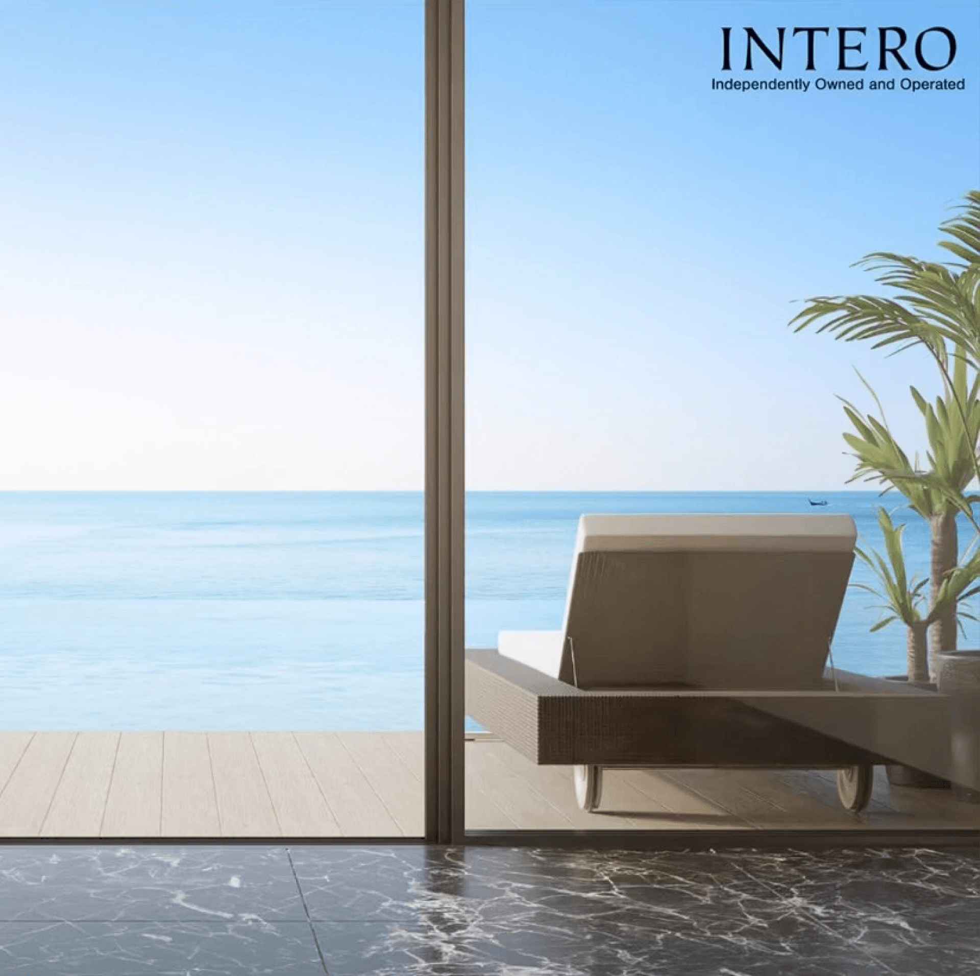 A view of the ocean through a sliding glass door