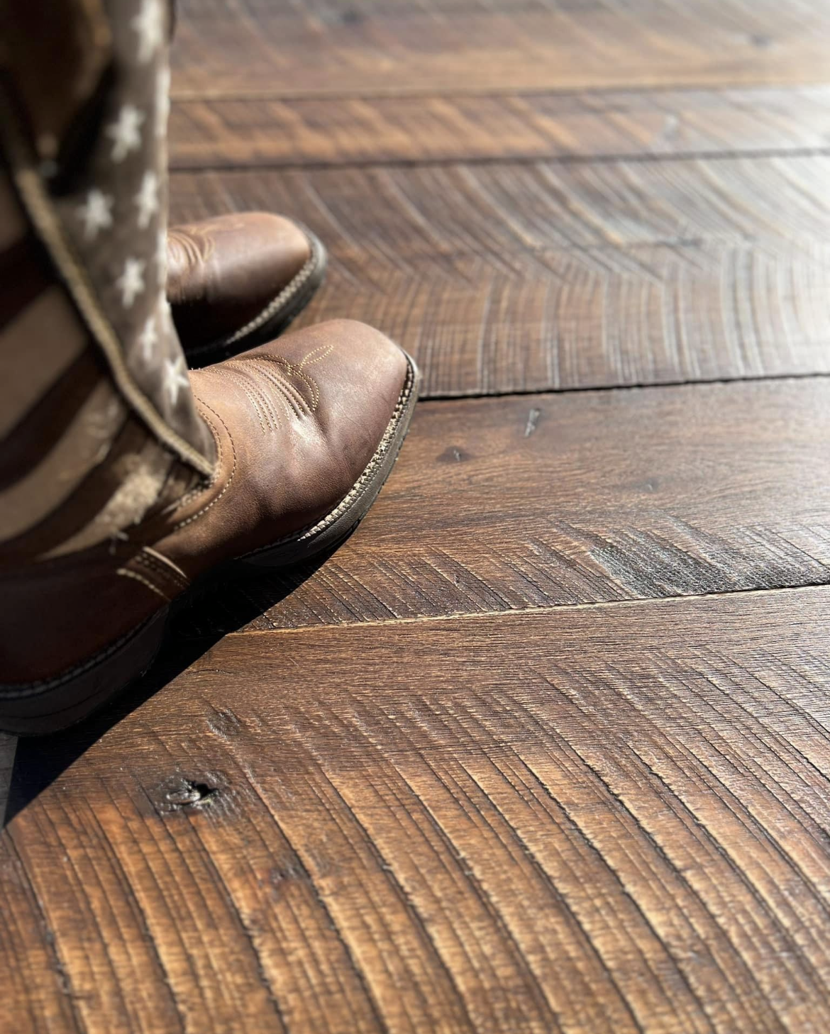 Hand Scraped Flooring Surface and Cowboy Boots