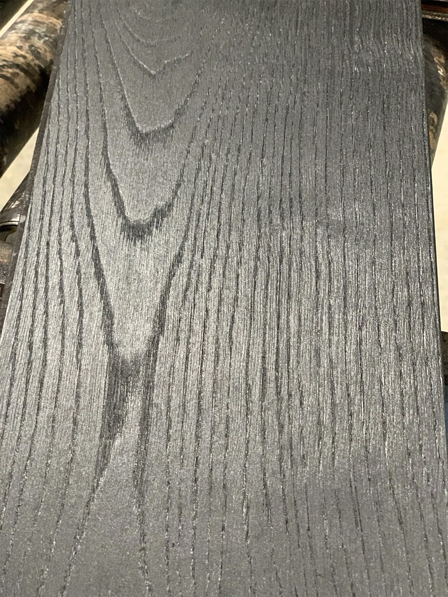 Black-stained, wire-brushed oak hardwood flooring