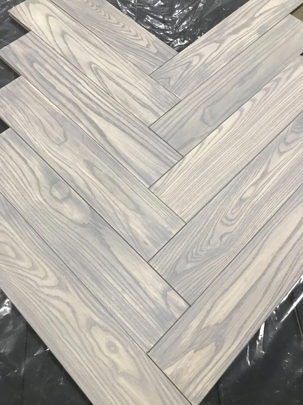 Live-sawn white oak herringbone hardwood flooring