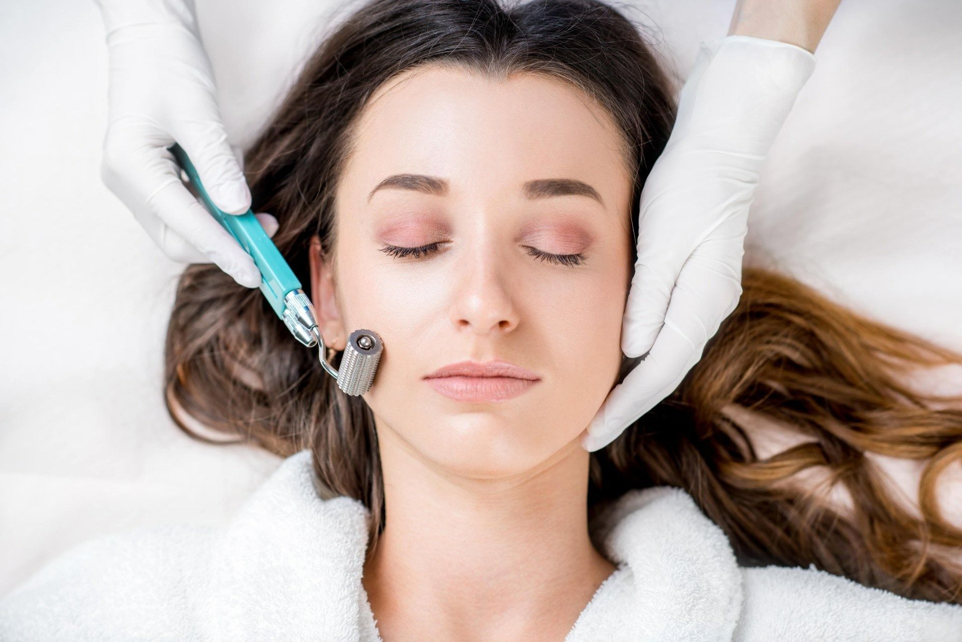 Woman Undergoing a Microneedling Facial Treatment — Body Sanctuary in Anula, NT