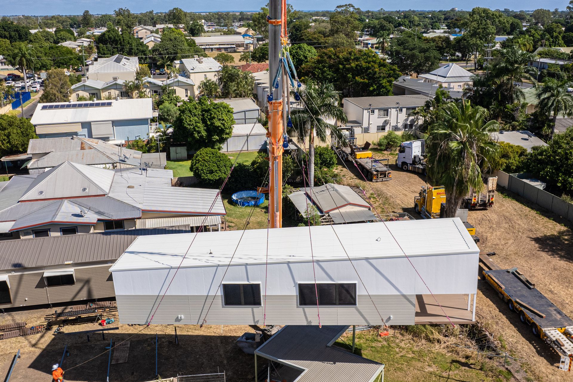 An Aerial View Of A House Being Built In A Residential Area — Dynamic Crane Hire In Emerald, QLD