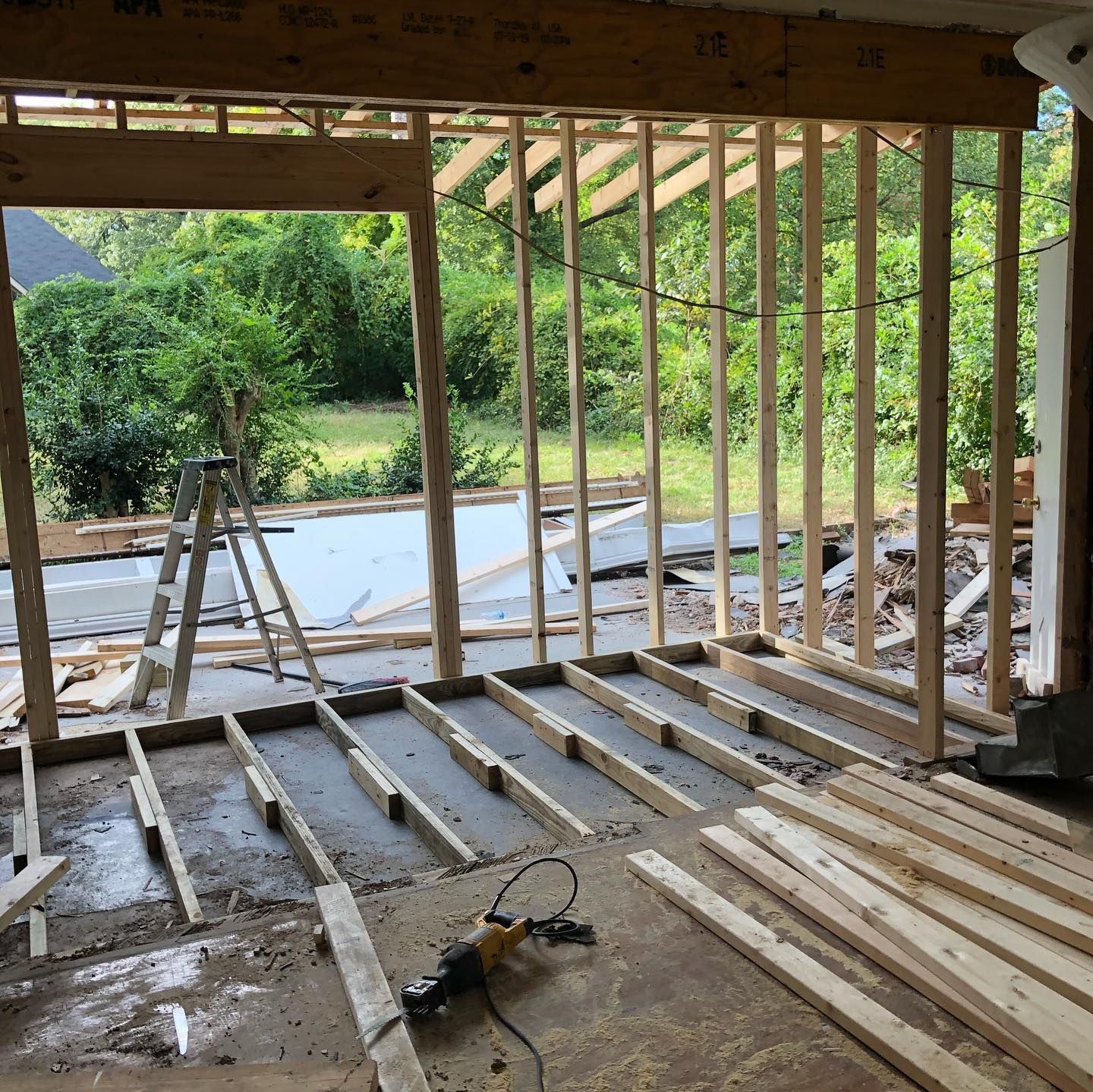 A room that is being built with wooden beams