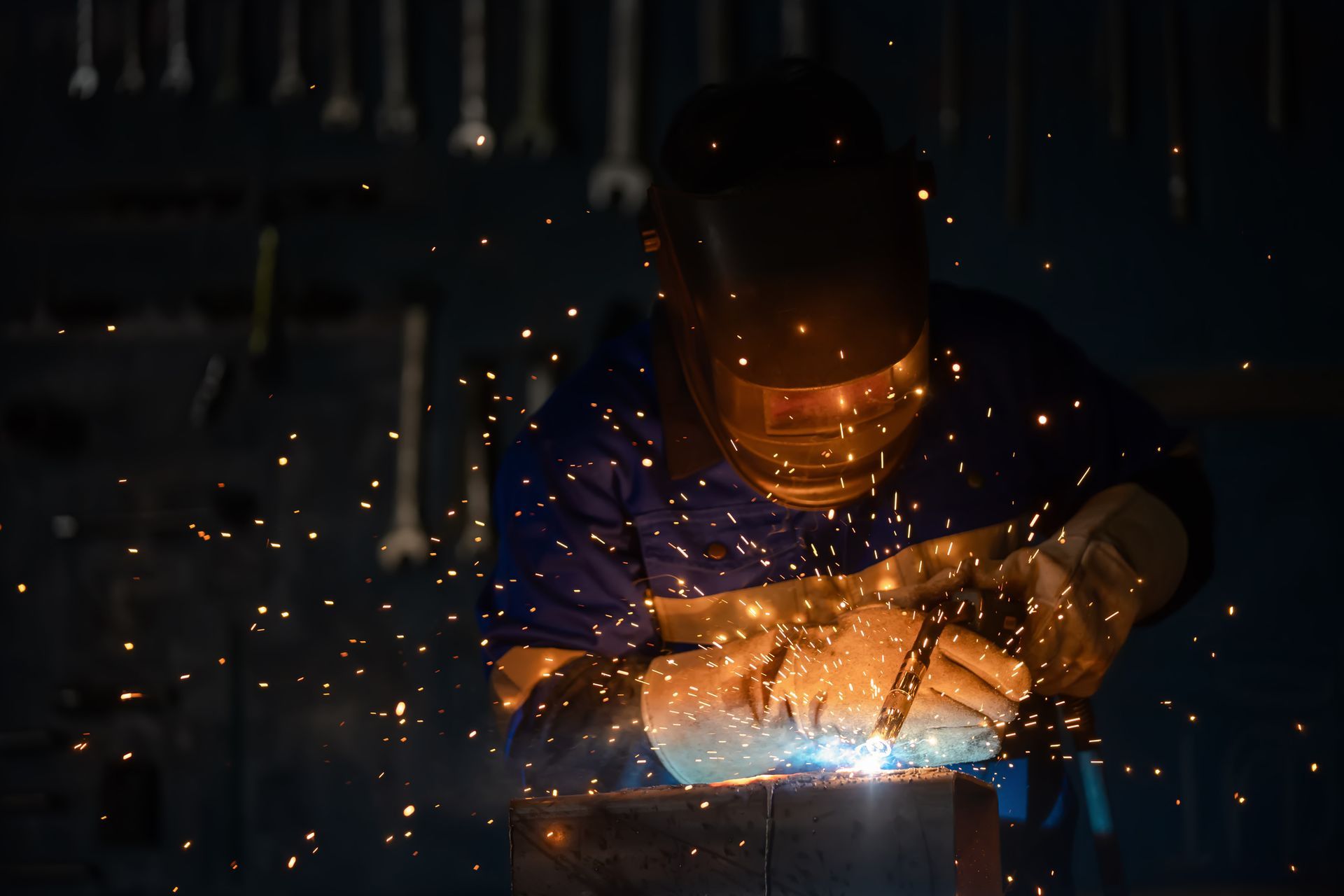 Precision craftsmanship in custom metal work by skilled industrial artisans. 