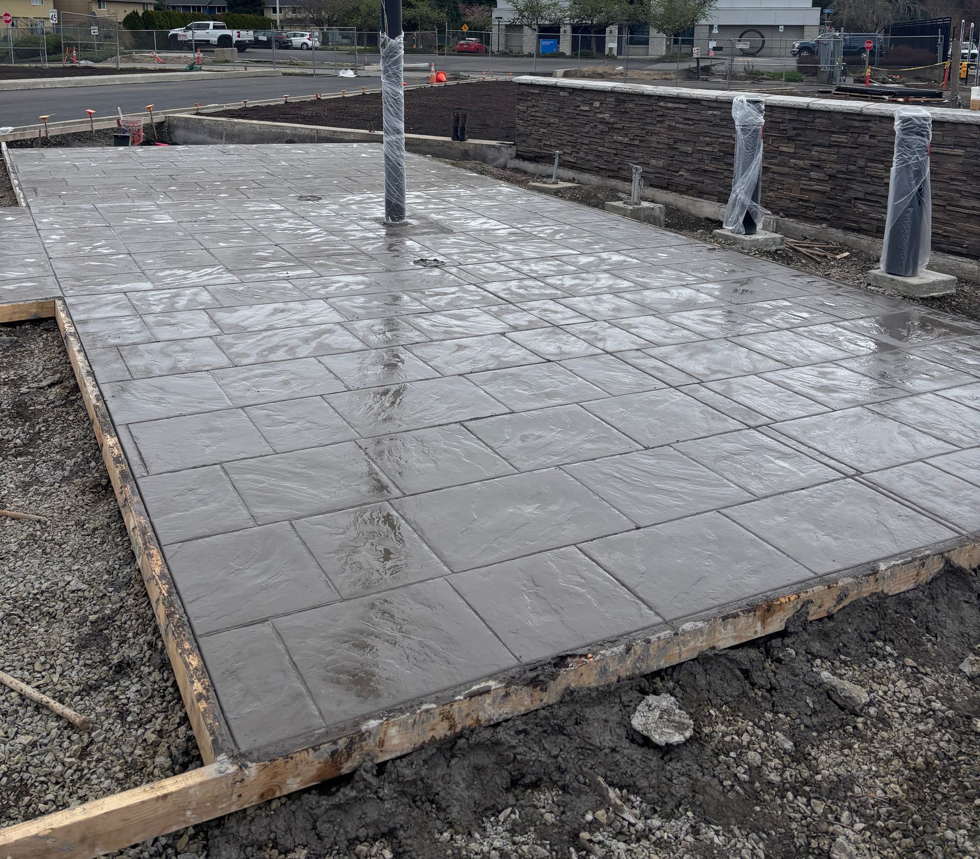Freshly poured concrete slab with stamped pattern 