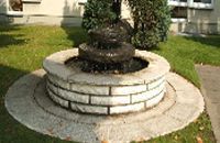 Gartenanlage vom Haus am Buschkämpen mit Zierbrunnen