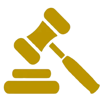 A yellow judge 's gavel is sitting on top of a pile of blocks.