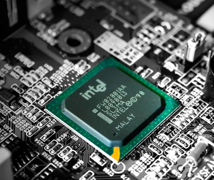 A close up of an intel processor on a motherboard