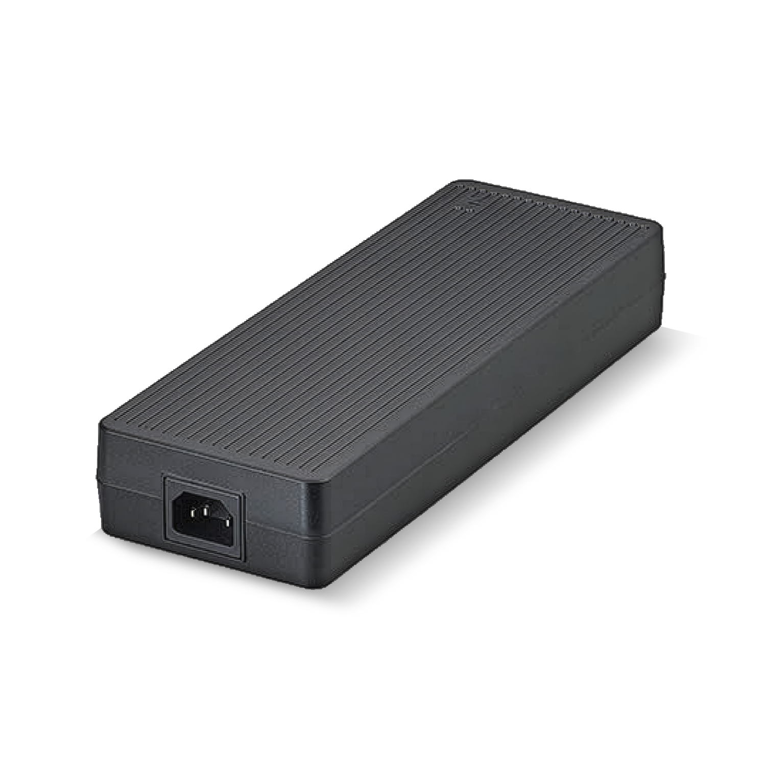 A black desktop power supply is sitting on a white surface.