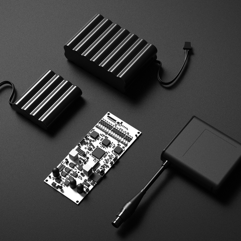 black batteries are laying on a black surface