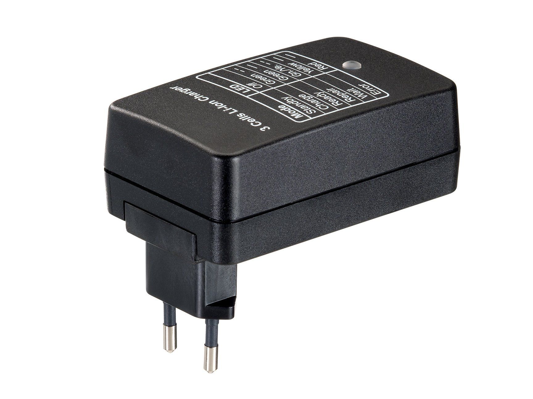 A black charger is sitting on a white surface.