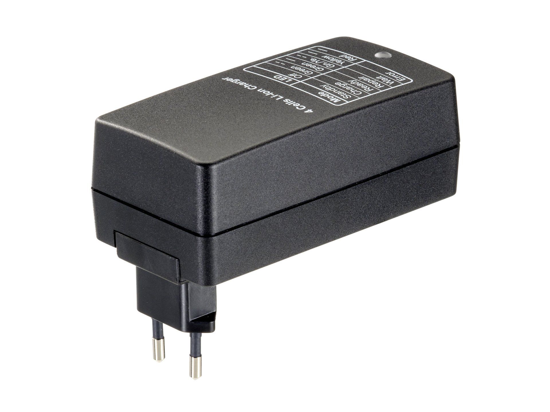 A black charger is sitting on a white surface.