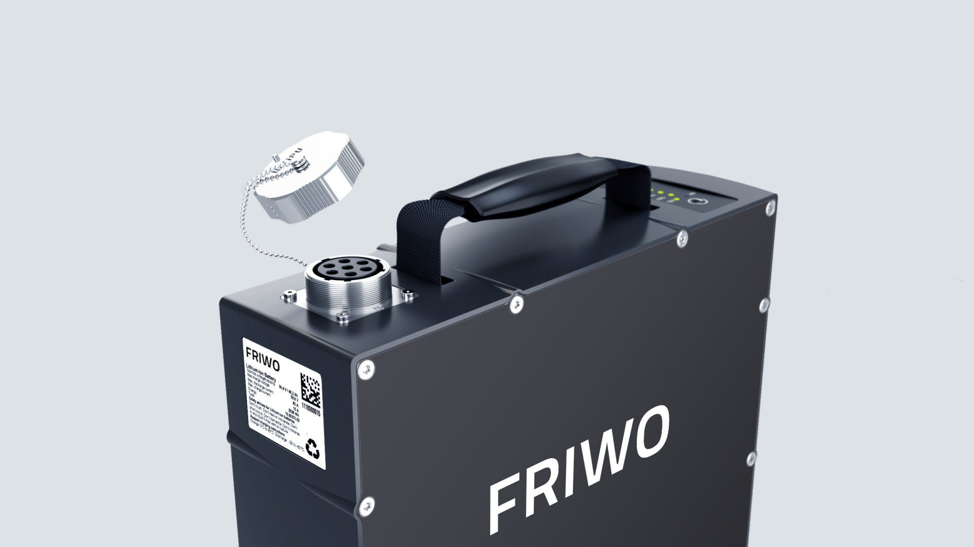A battery with the word friwo on it is sitting on a table.