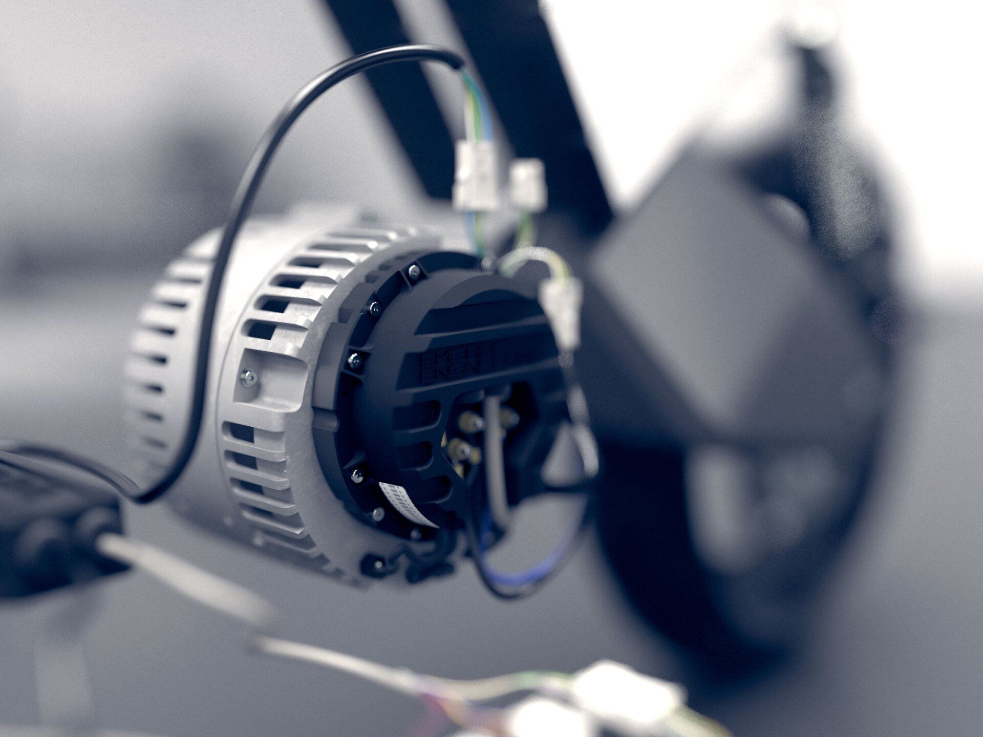 A close up of a motor with wires attached to it