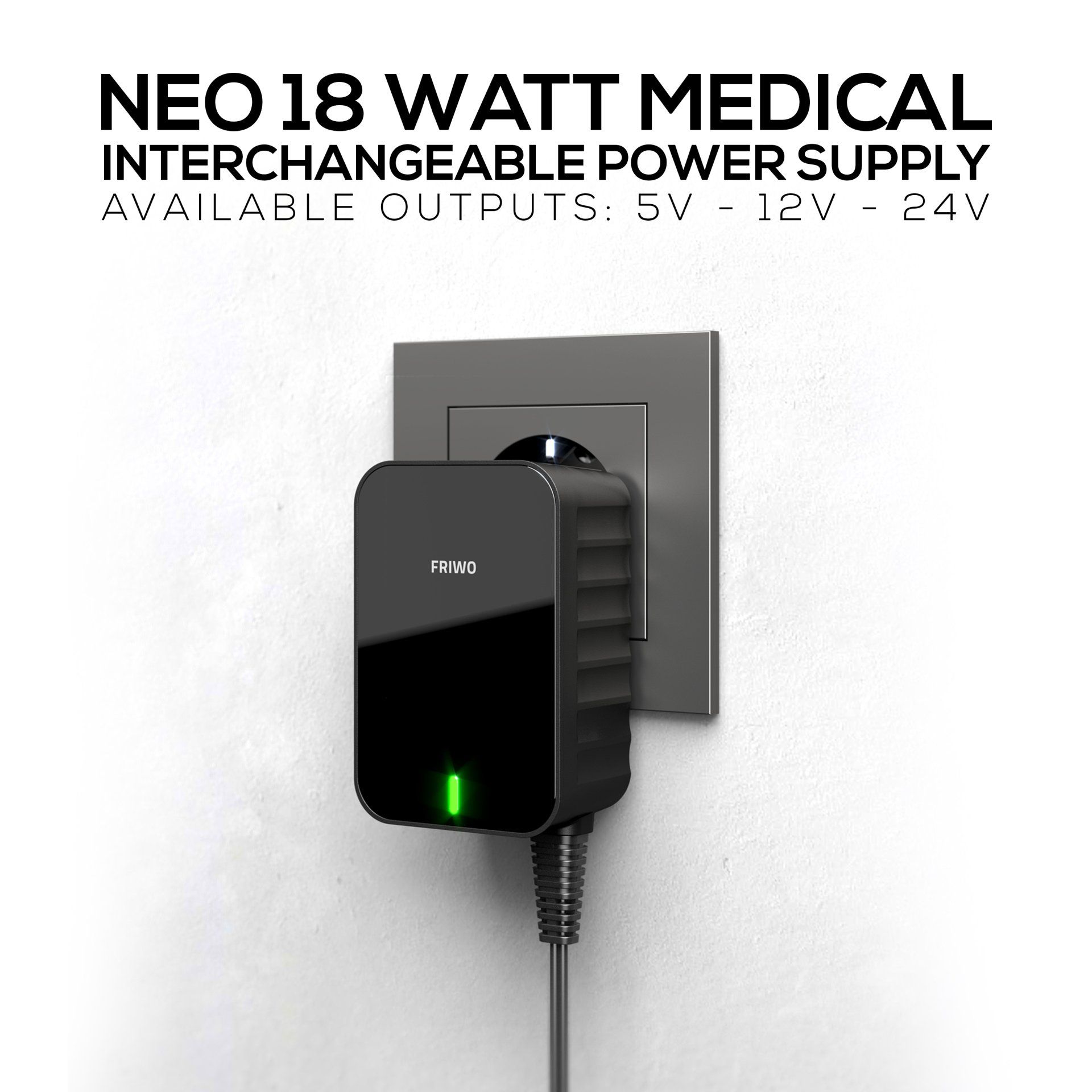 A neo 18 watt medical interchangeable power supply is plugged into a wall socket.