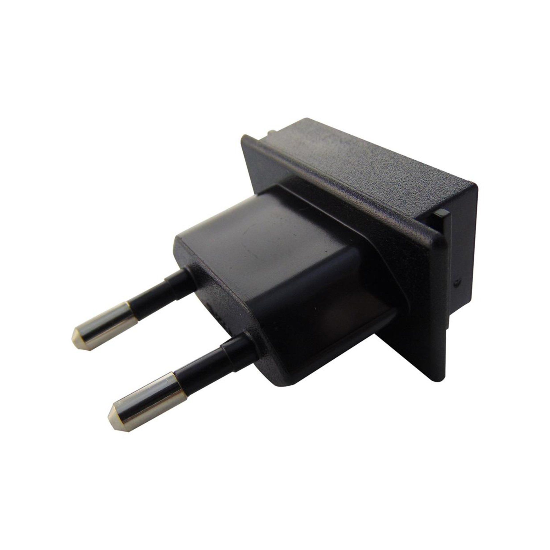 A black plug with two metal pins on a white background