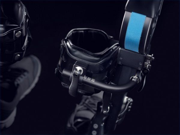 An exoskeleton  with a blue stripe on it