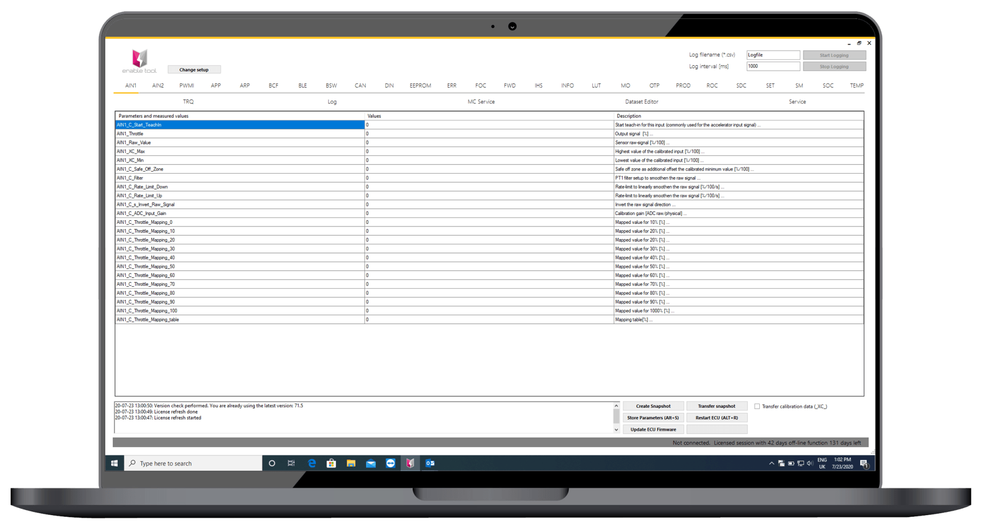 A laptop computer with a spreadsheet on the screen.