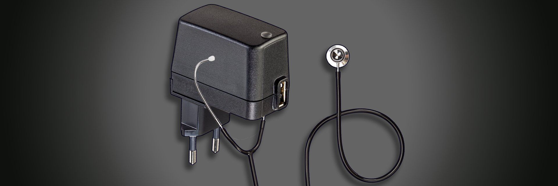 A USB power supply with a stethoscope attached to it