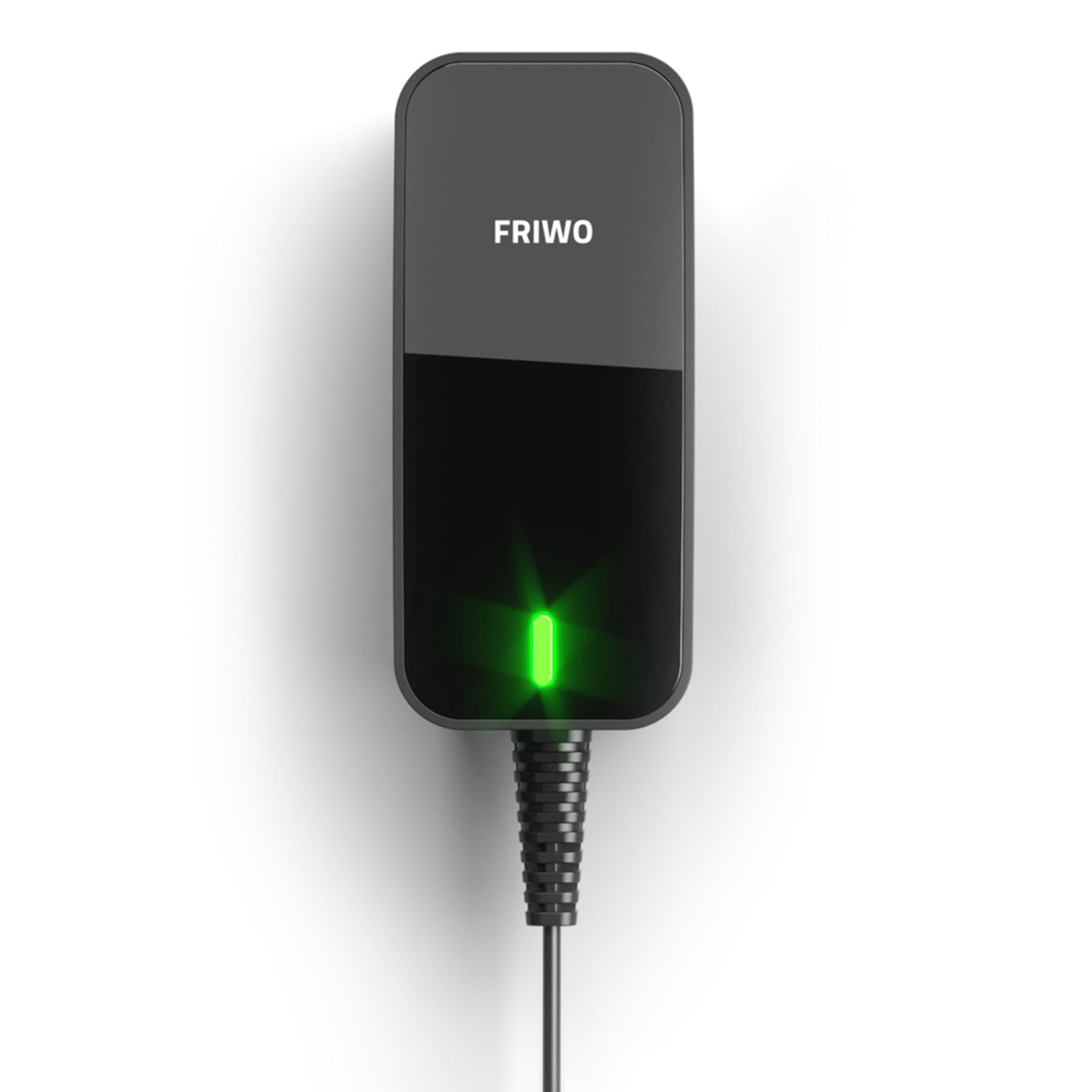 A black power supply with a green light on it is plugged into a wall.