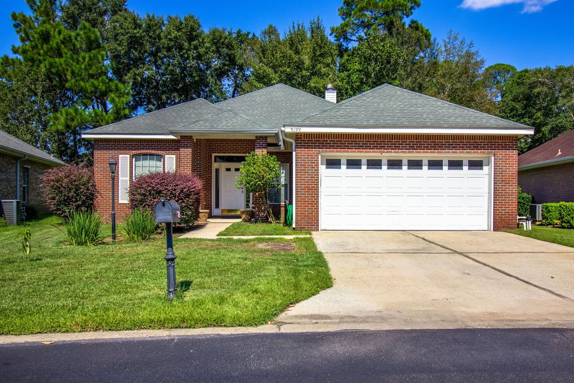 Exterior Photo of a brick house with garage