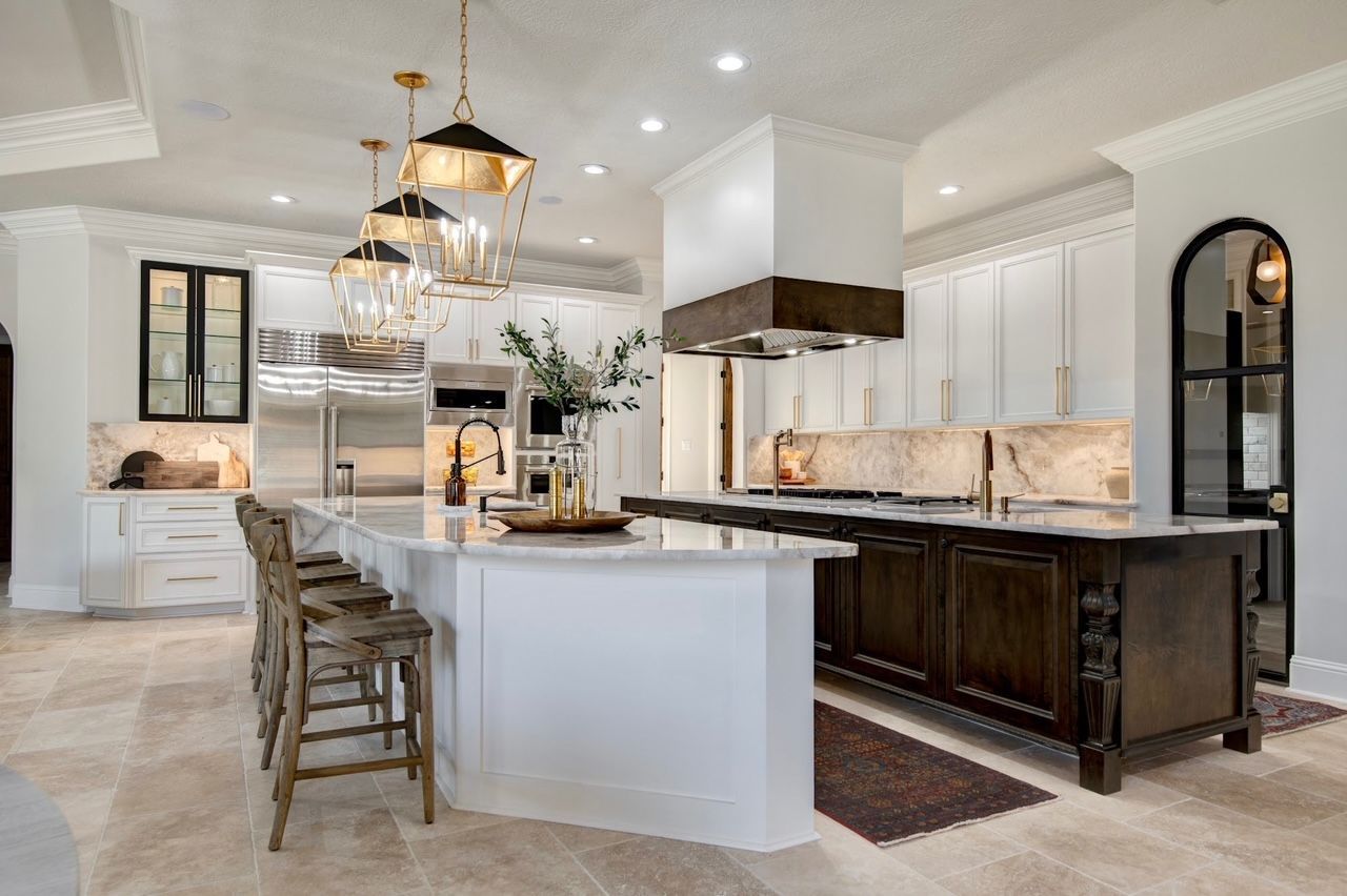 There is a large island in the middle of the kitchen.