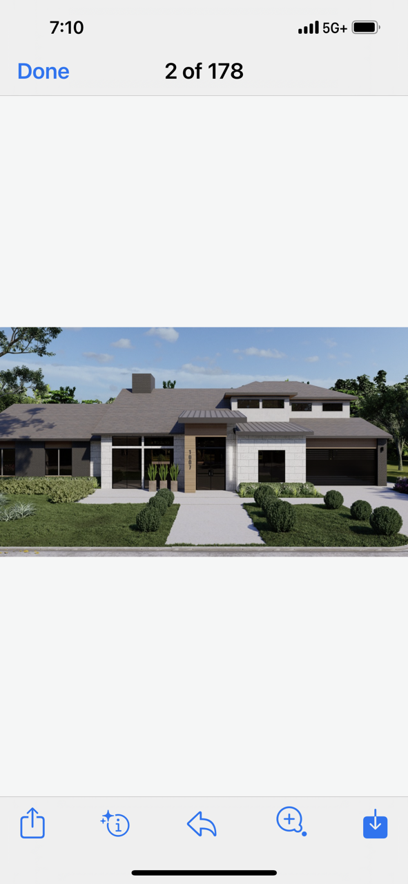 A picture of a house on a cell phone.