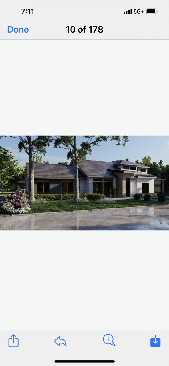 A picture of a house on a cell phone.