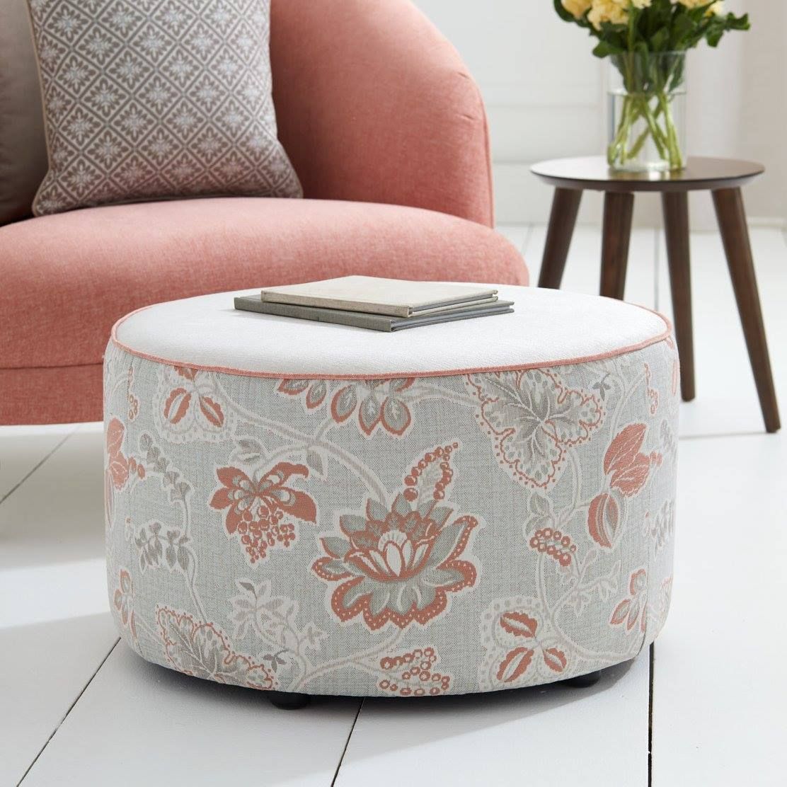 A Round Ottoman With A Floral Pattern Sits Next To A Pink Chair — Aztak Upholstery In Manunda, QLD