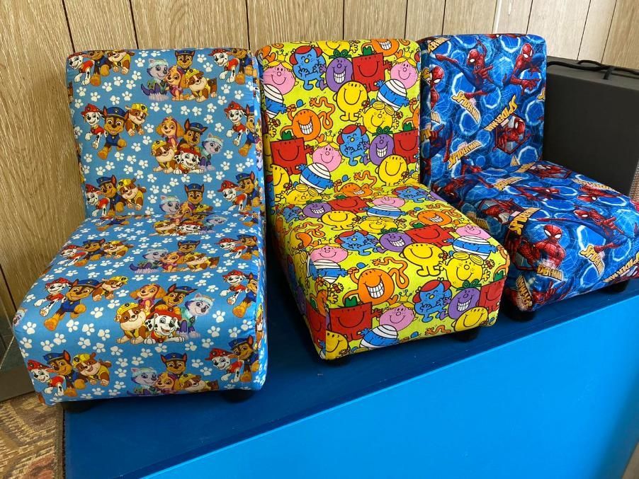Three Colourful Chairs Are Sitting On Top Of A Blue Table — Aztak Upholstery In Manunda, QLD