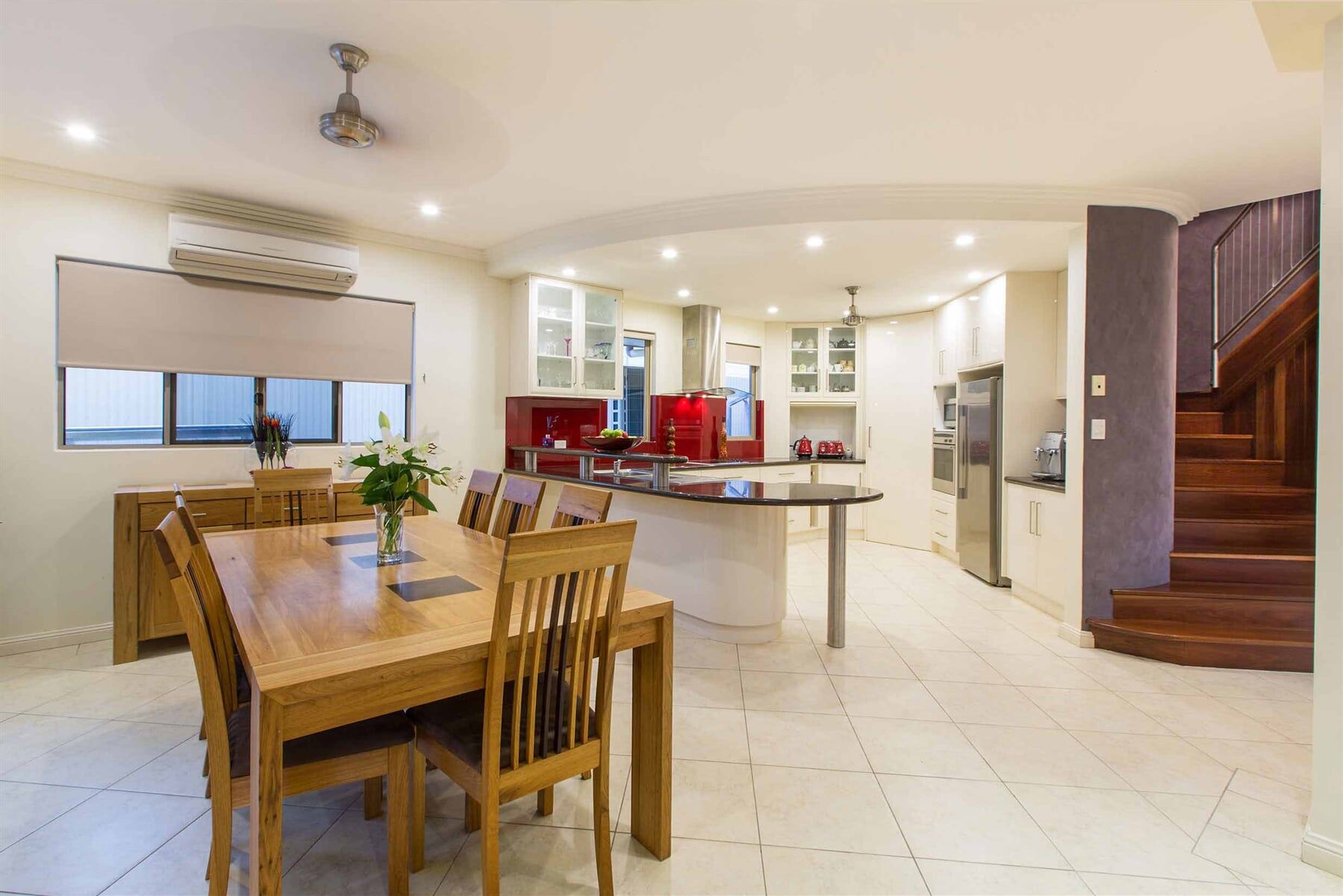 Kitchen Area, Dining Area And Stairway