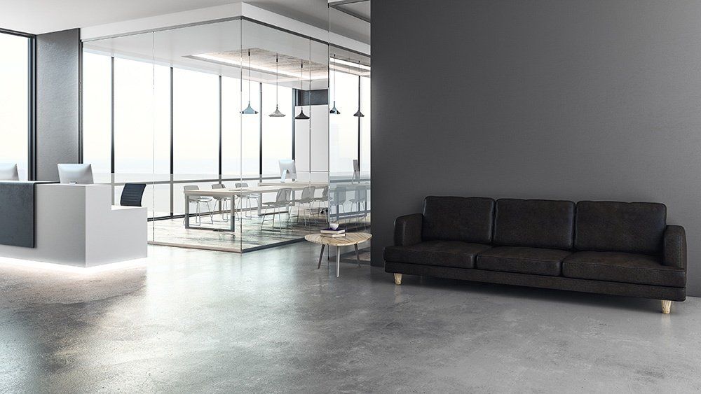 there is a couch in the middle of the room .