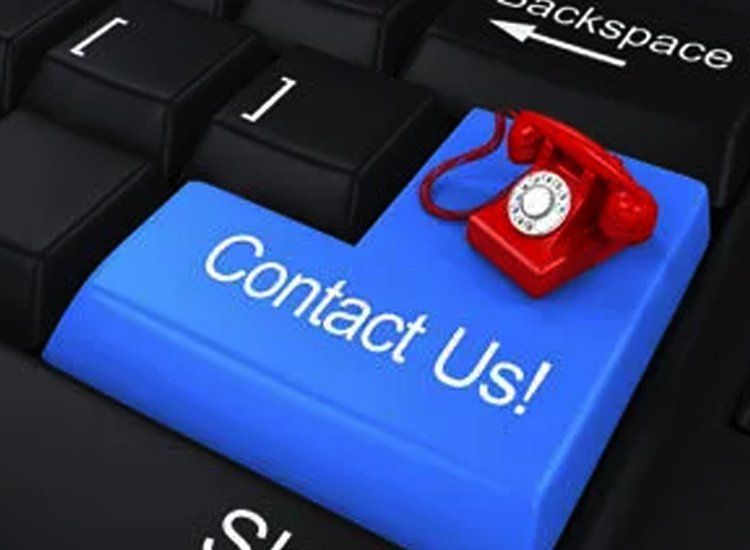 keyboard with contact us written