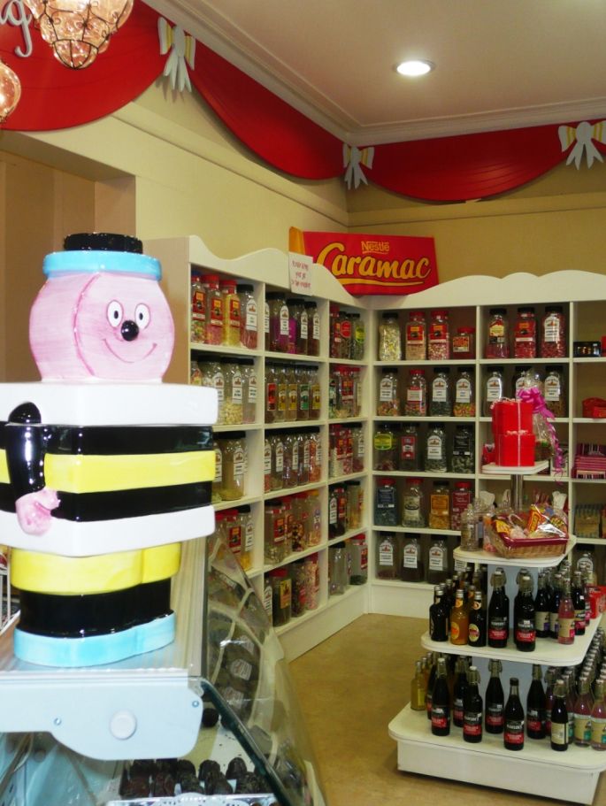 sweetshop interior with giant liquorice allsorts figure