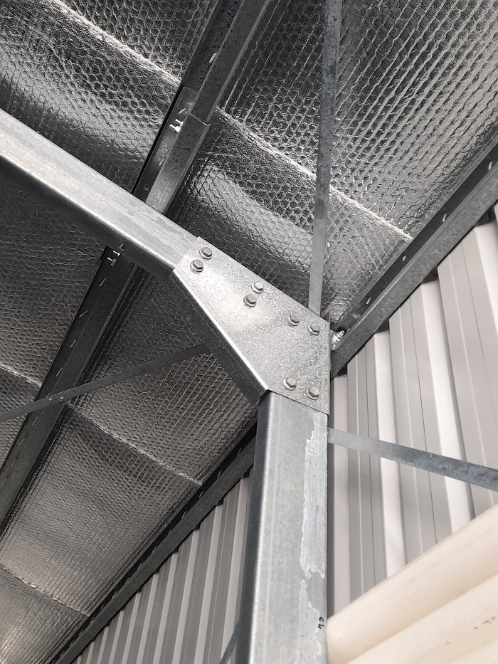 A Close Up Of A Metal Structure In A Building — Whit Coast Sheds in Gregory River, QLD