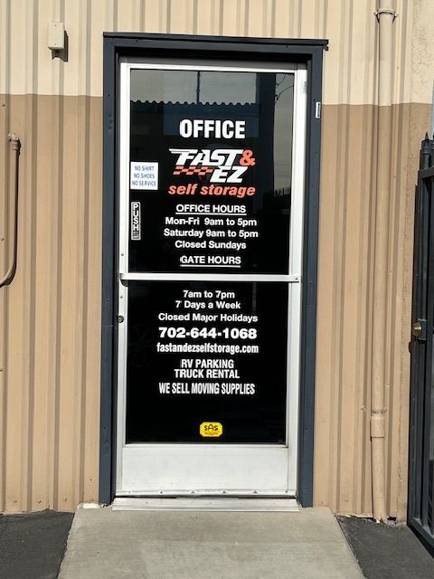 A door that says office fast ez self storage on it