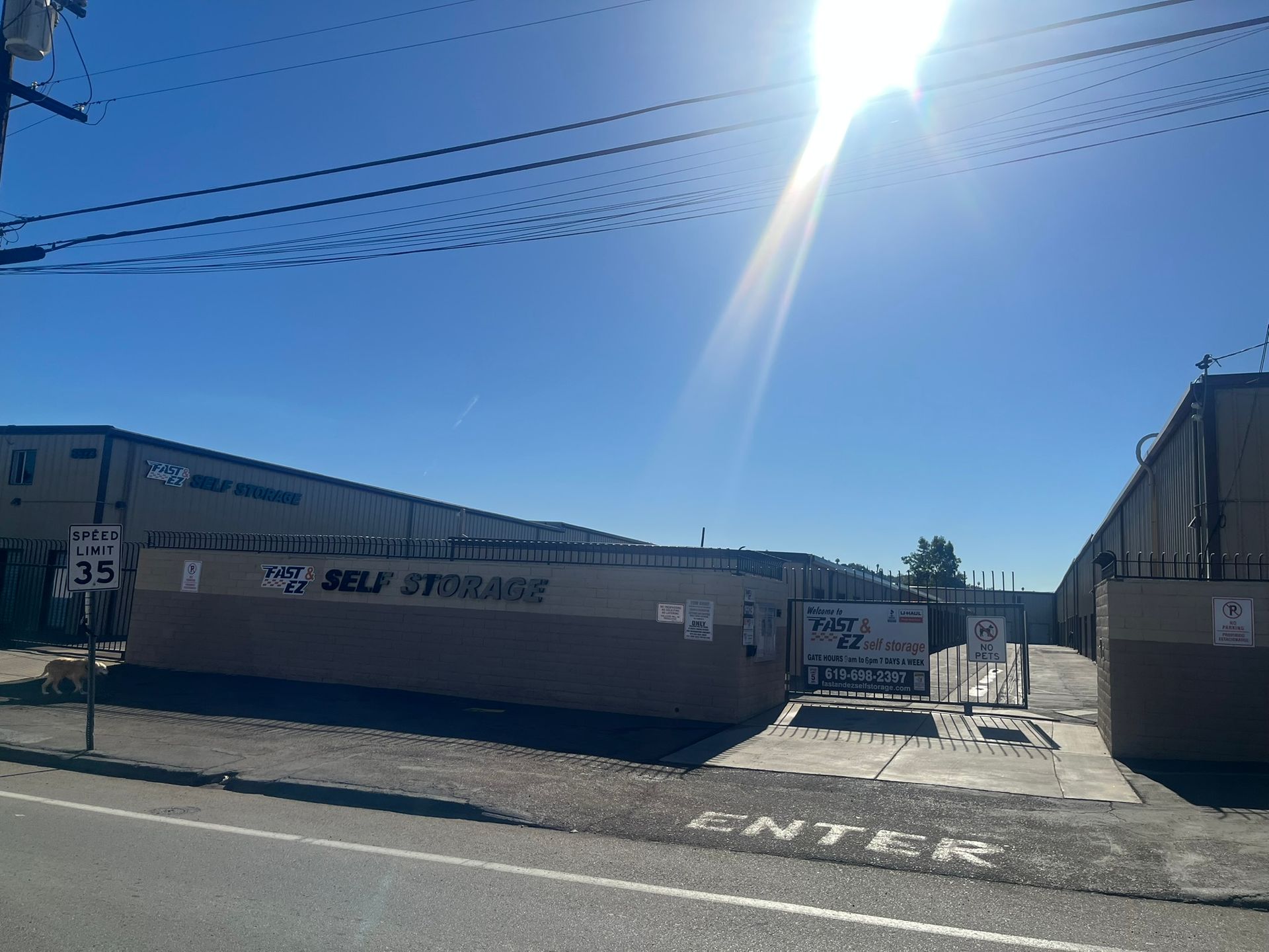 A self storage facility is located on the side of the road.