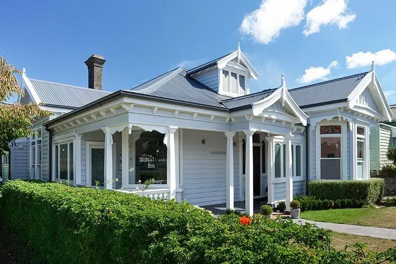 House with a Gray Roof and a Porch — Auckland, NZ — Pro Roofing