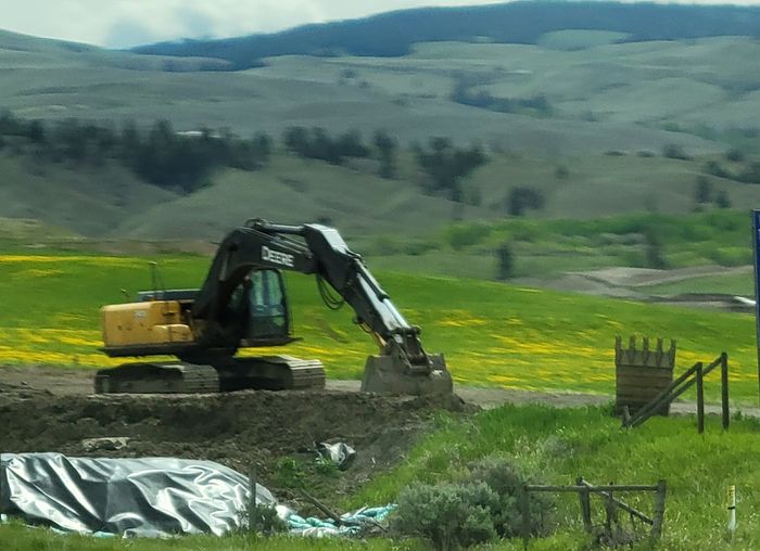 drilling to break up rock for a building foundation