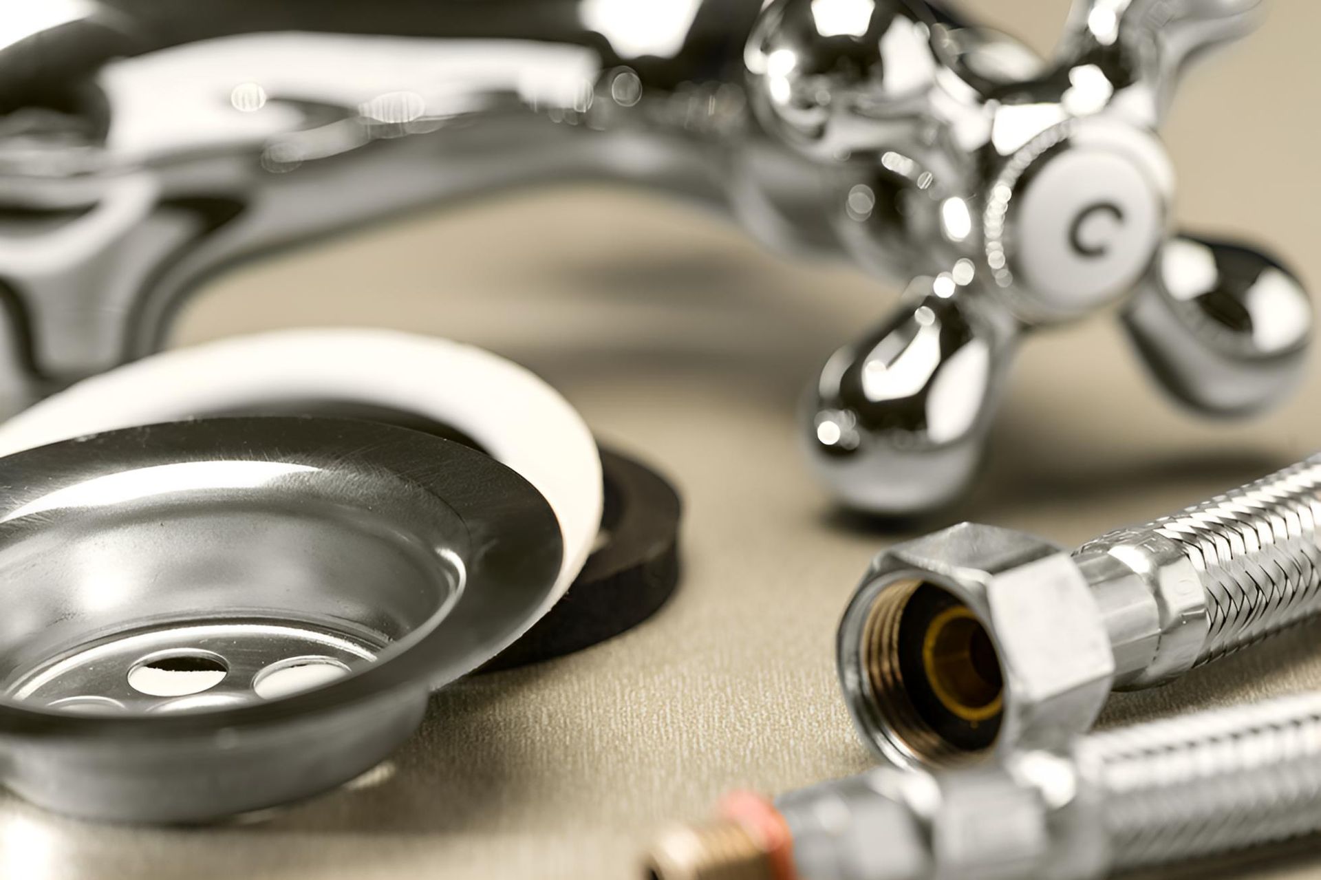A Close Up Of A Sink Faucet — Action Hose & Fitting Solutions In Loganholme, QLD