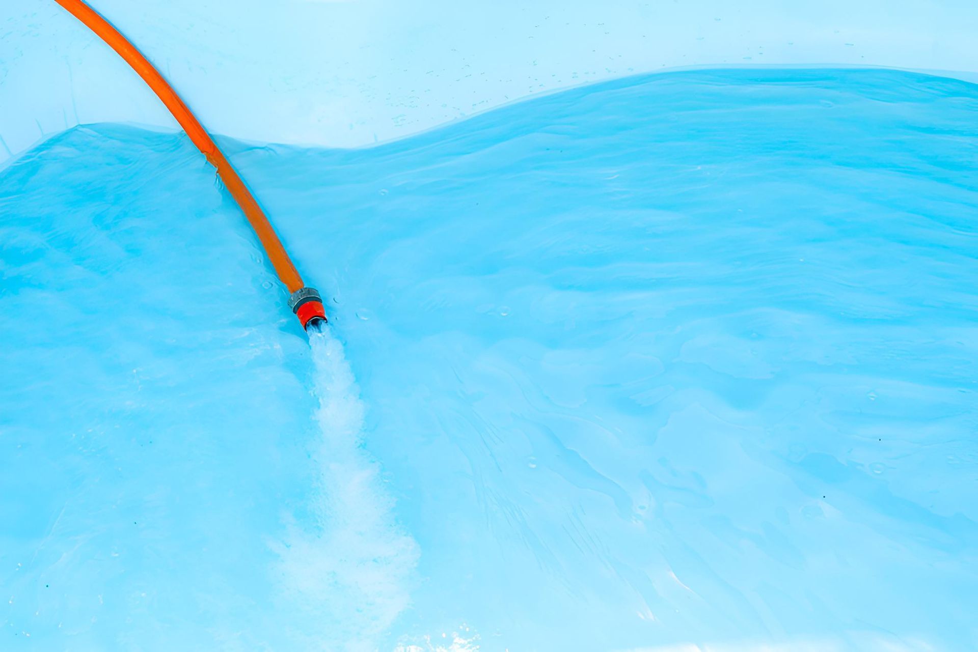 A Hose Is Spraying Water — Action Hose & Fitting Solutions In Gold Coast, QLD