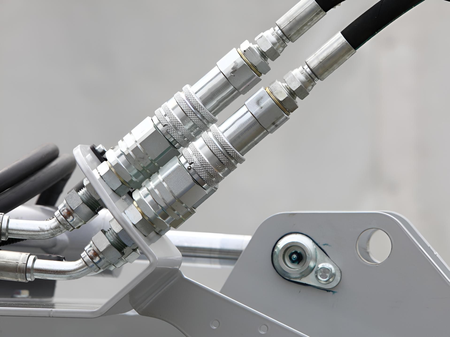 A Close Up Of Two Hydraulic Hoses — Action Hose & Fitting Solutions In Loganholme, QLD